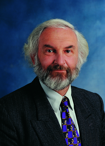 R.G. (Graham) Bell (1943-2023) in a studio portrait, 1998
