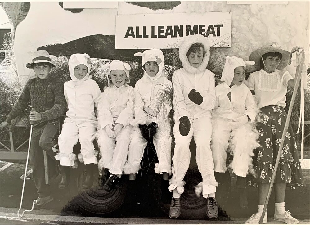 Dunedin Parade with 'Invermoose'. 2. Children sitting on a parade float at a community event
