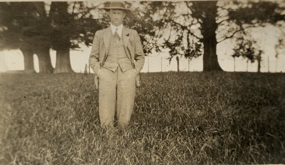Farmer standing proudly on his land