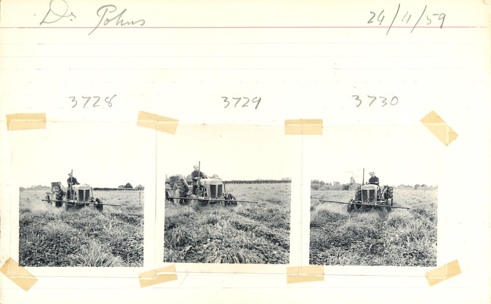 Man driving a tractor in field
