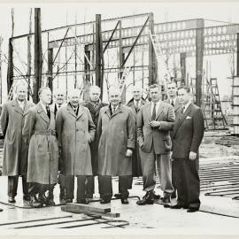 Inspecting progress on building construction