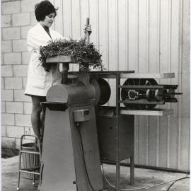 Pamela Fletcher operating a grinder