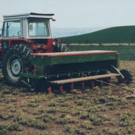 Red SeedoMatic, Massey Ferguson 590 series, row-crop tractor