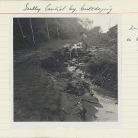 Gully control by bulldozing. 10. Secondary head erosion