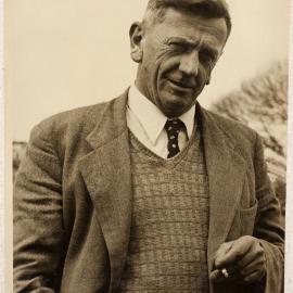 C.P. McMeekan (1908-1972) smoking a cigarette