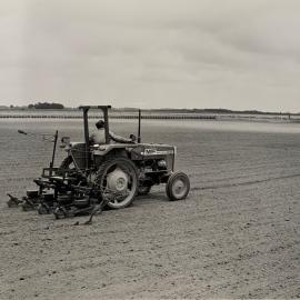 John James driving the Stanhay precision seeder at Aorangi - B&W version
